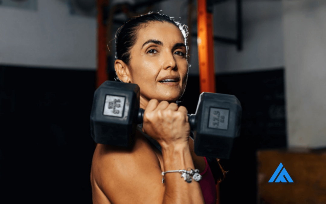 Woman over 40 building strength and resilience with dumbbell exercise